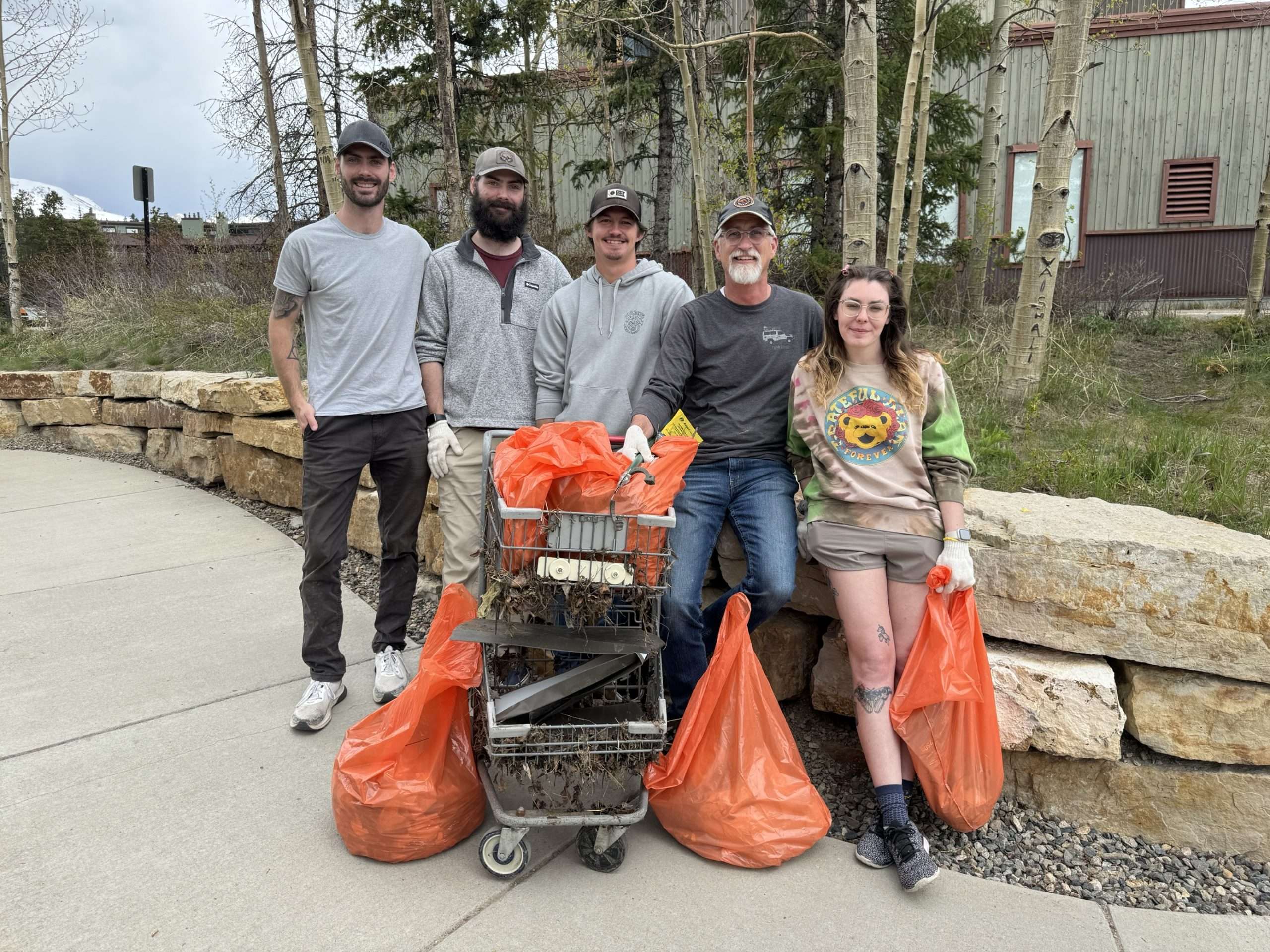 Photo from left to right: Zack Kelley, Nick Kelley, Bryce Coop, Philip Williams, and MJ Levine, participating in a local community volunteering event to help clean up trash.