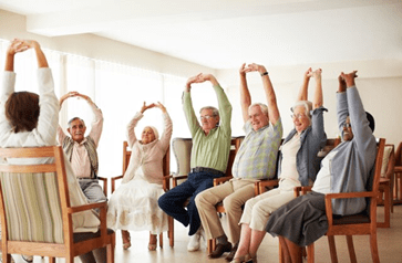 Elderly people doing exercises